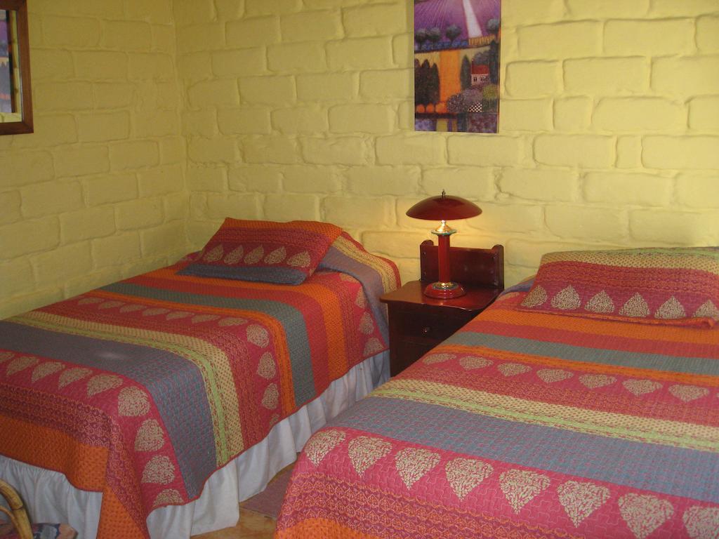 Casa Madre Tierra Otel Vilcabamba Oda fotoğraf
